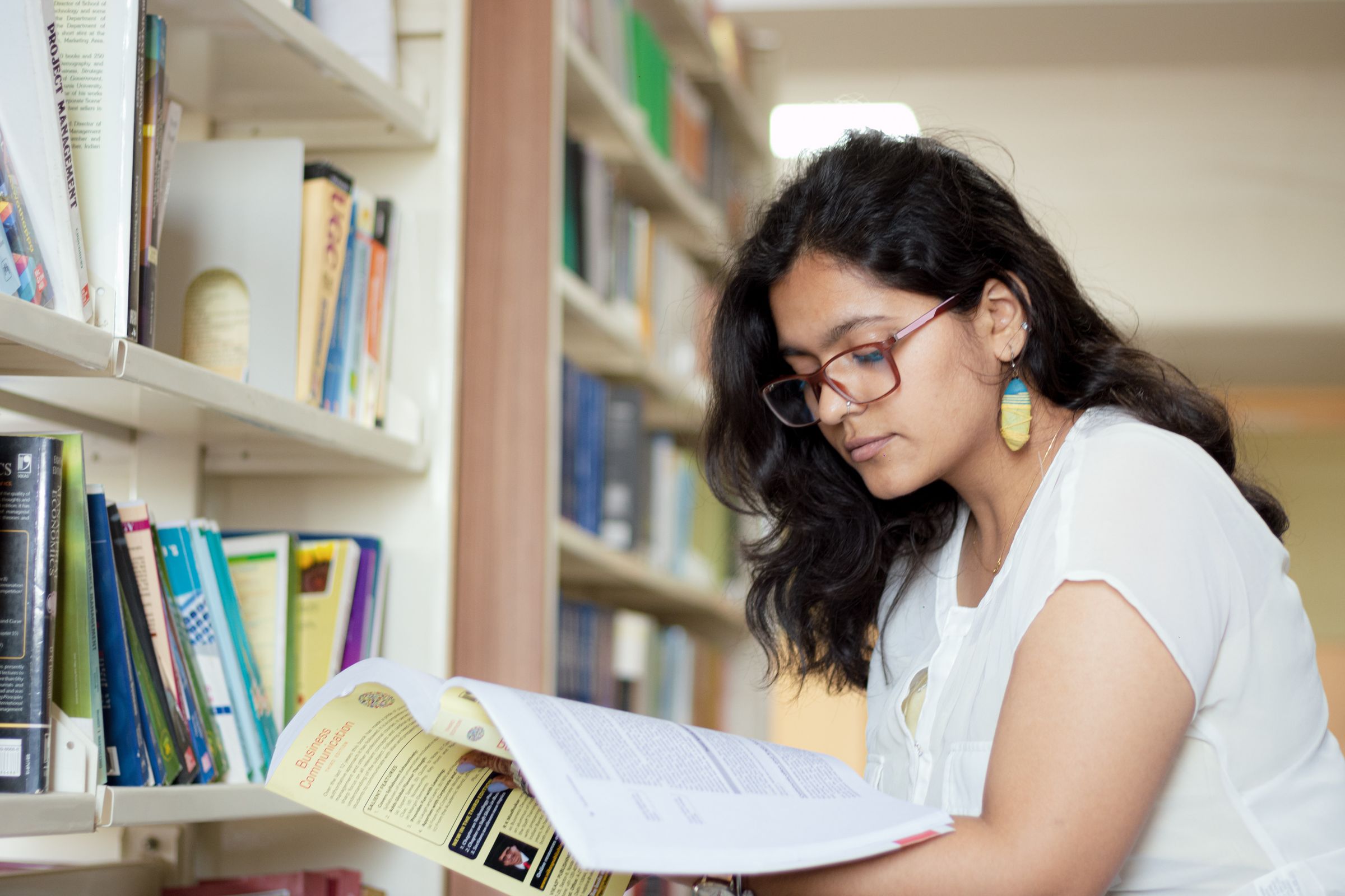A student reading in the library