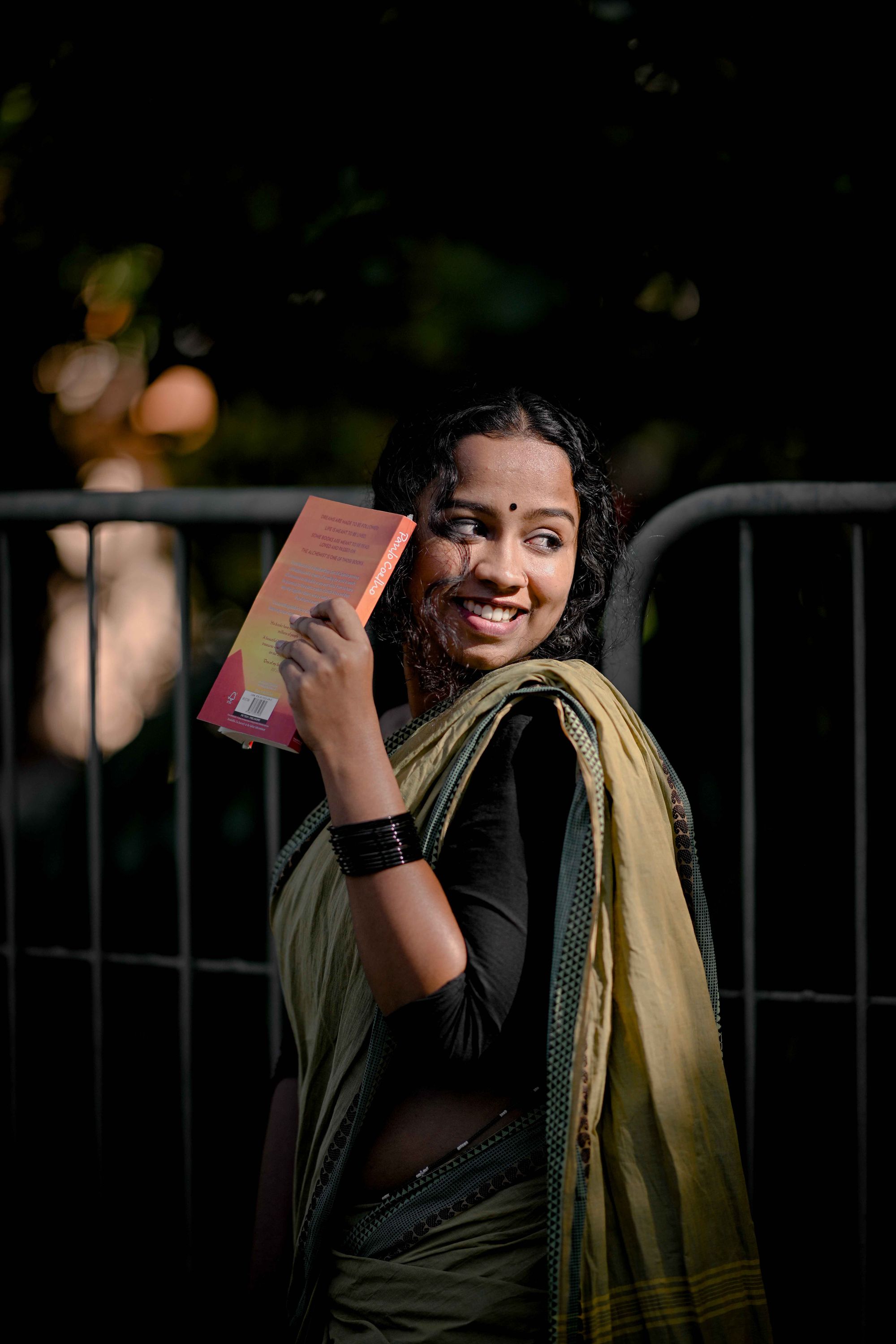 A Vivekanandha woman student with a book