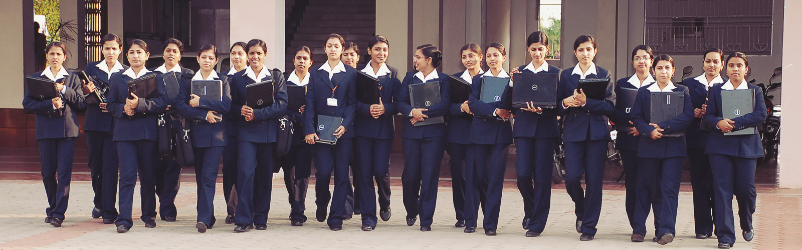 Women students walking on campus